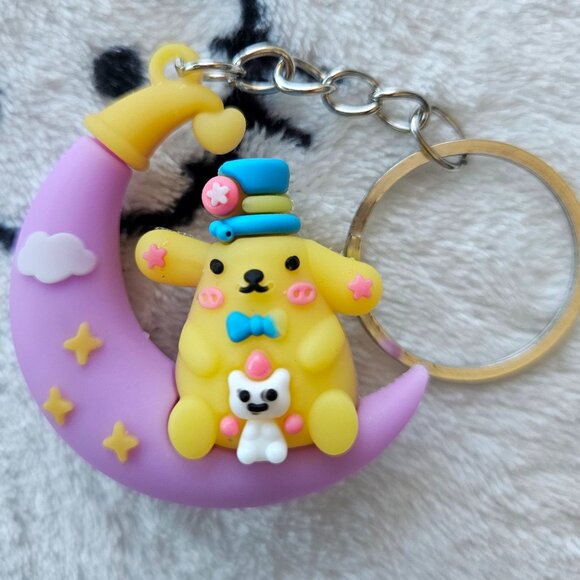 New Pompompurin on Purple Moon Keychain - Picture 1 of 2